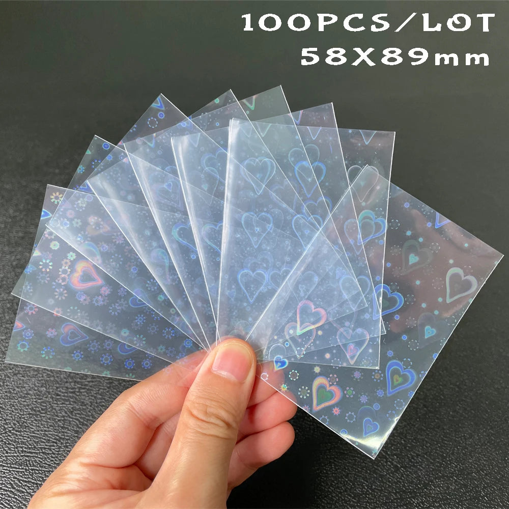 100 unids/lote, fundas para tarjetas TCG con carga superior láser en forma de corazón, Protector de fotos para juegos de mesa YGO, funda protectora para tarjetas comerciales